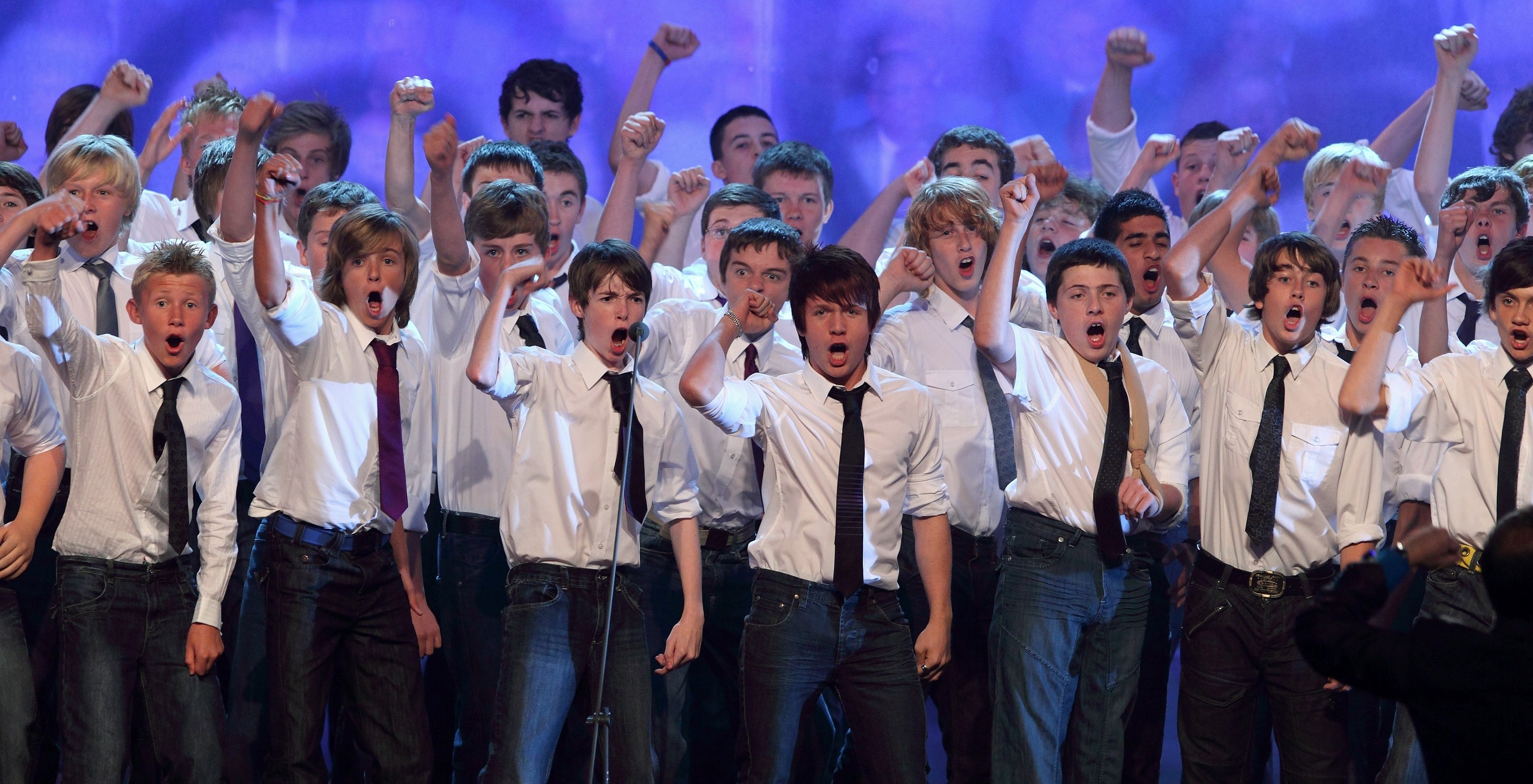 Members of Only Boys Aloud performing on stage