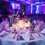 A close up of a table laid ready for guests