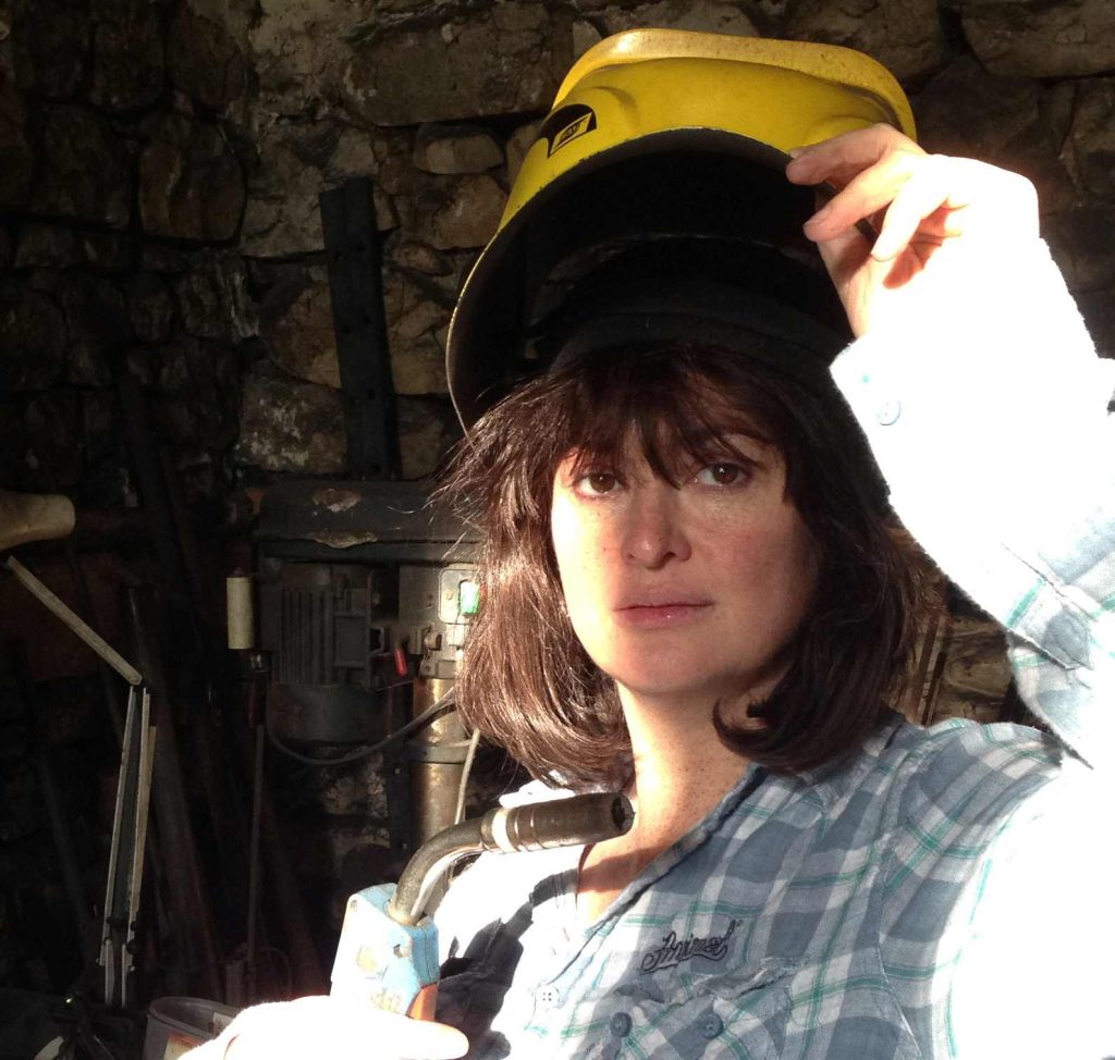 Angharad in welding helmet